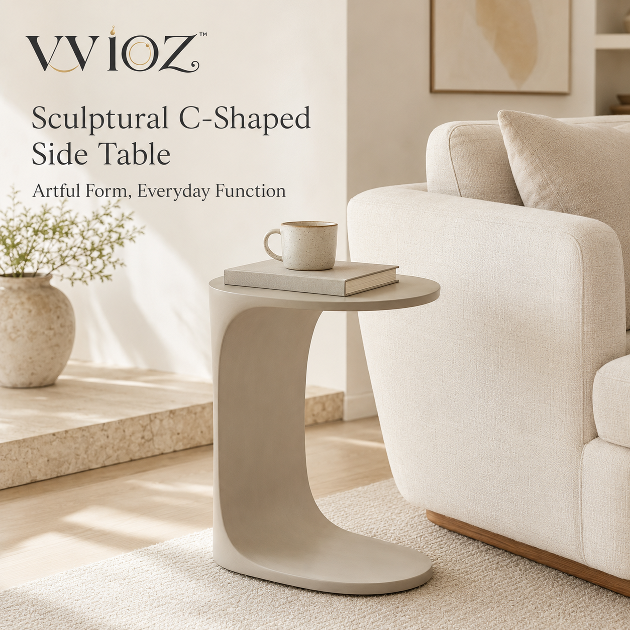 vvioz sculptural C-shaped side table beside a cream sofa